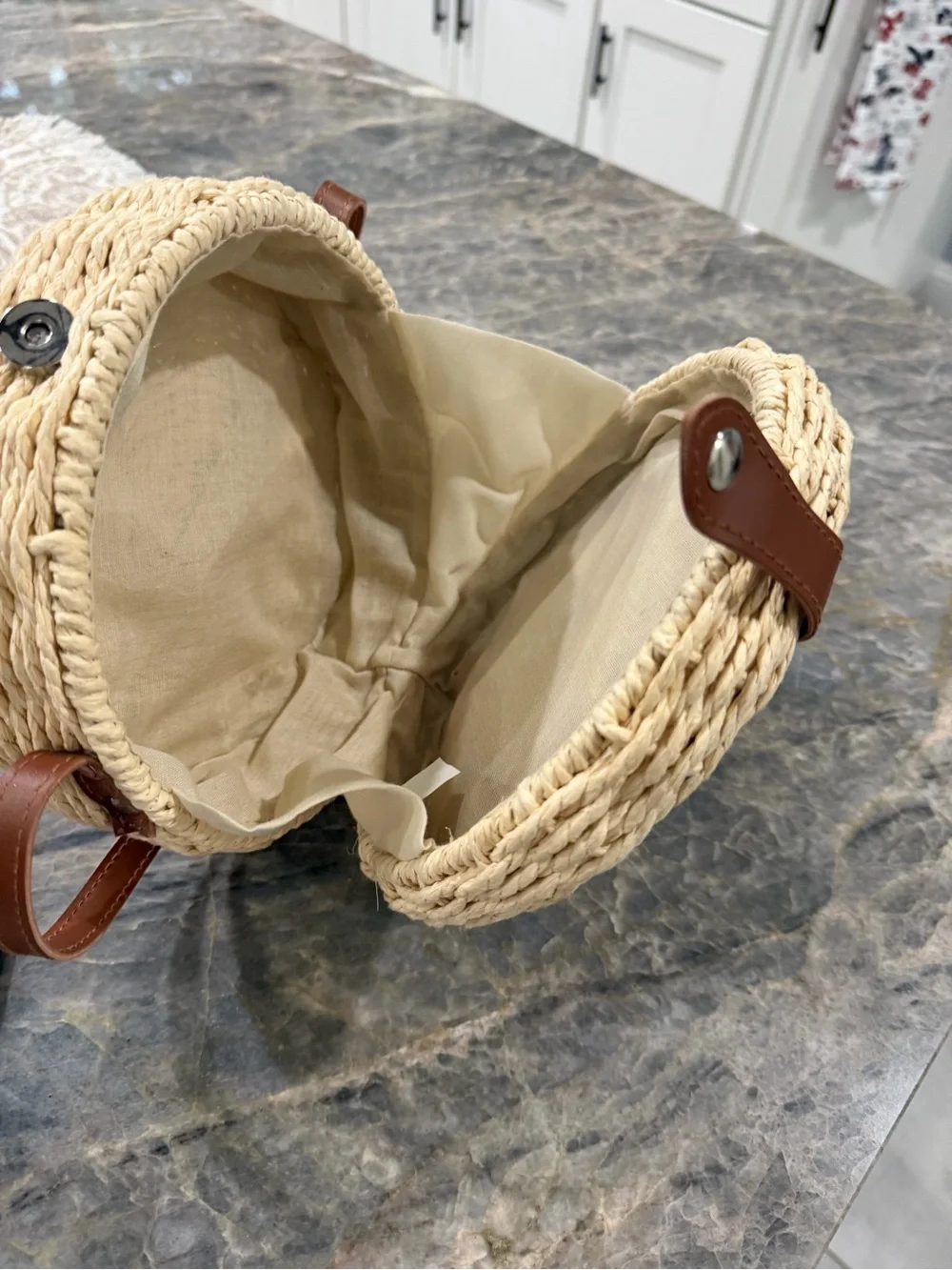 Handwoven Round Crossbody Bag with Beaded Evil Eye - Natural Straw & Blue Accent